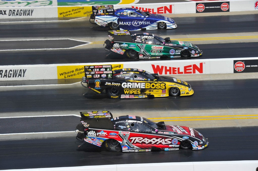 Photo: Ron Lewis Photography/JFR Racing unny Car racing was never tighter than at the 4-Wide Nationals with John Force and Tommy Johnson, Jr. taking round wins  