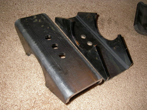 One inexpensive fix we have seen drag racers do was to add longer spring perches like those from Ruff Stuff. The longer perch (left), adds leverage against the forces acting on the spring, and helps reduce spring wrap up.