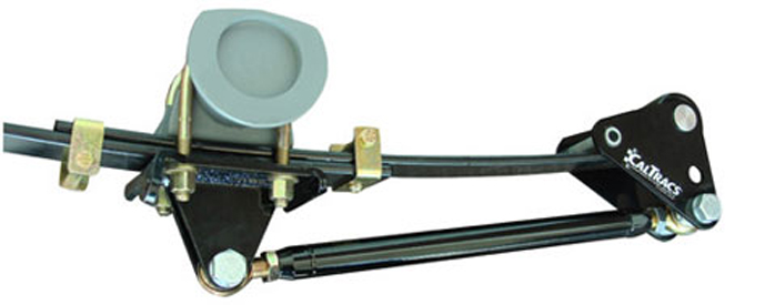 The CalTrac traction bar system is a bolt-on upgrade to the rear suspension that is designed to eliminate wheel-hop, and maintain pinion angle during launches. Operating similar to a four-link suspension, the force-transfer link bar transmits forward thrust from the rear axle to a point more toward the center of vehicle mass. This translates to a weight shift during launch towards the rear for increased traction and acceleration, and with a lot less potential for driveline and rear axle damage.