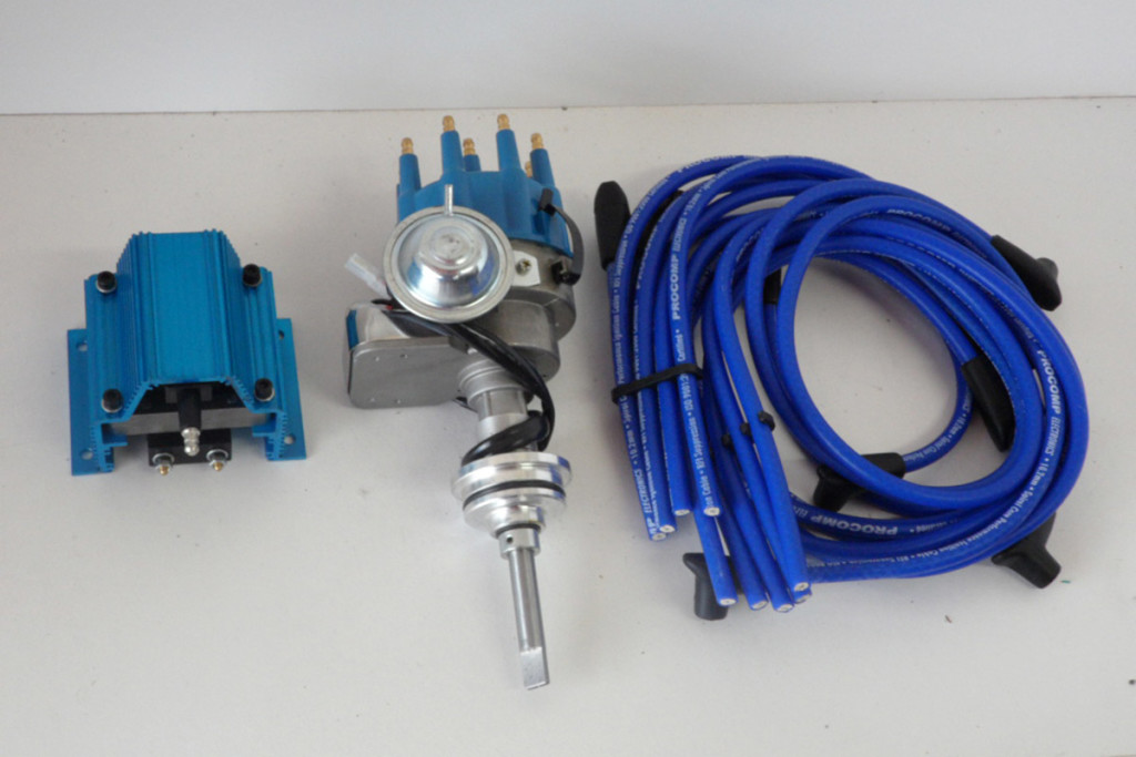 A performance standard points/breaker-type ignition upgrade consists of these items: New coil, distributor with cap and rotor, and new wires.