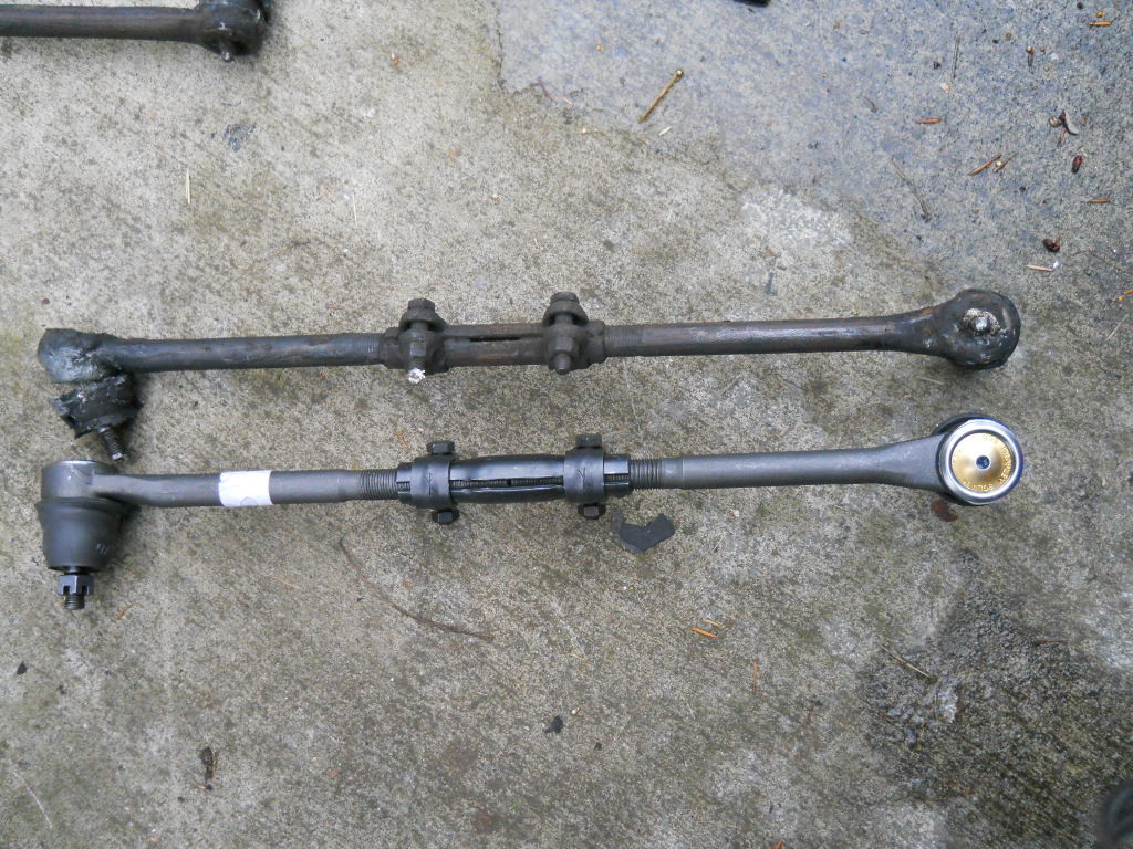 Inner and outer tie rod ends from an older GTO. This image perfectly shows the two nuts on the connecting sleeve and the sleeve that is rotated to adjust toe.