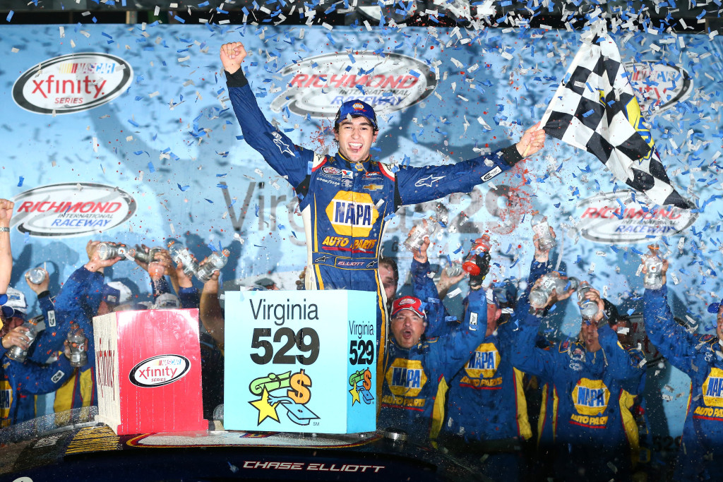 Chase Elliott, driver of the #9 NAPA Auto Parts Chevrolet, celebrates in Victory Lane after winning the NASCAR XFINITY Series Virginia529 College Savings 250 at Richmond International Raceway.