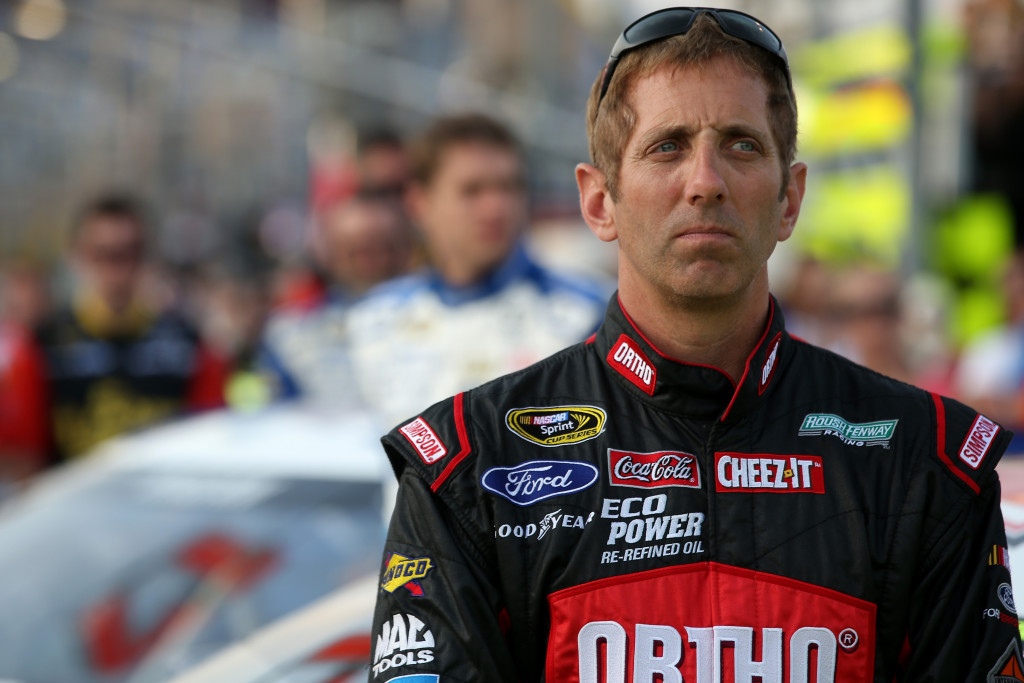 CHARLOTTE, NC - MAY 15: Greg Biffle, driver of the #16 Ortho Ford, stands on the grid prior to during the NASCAR Sprint Cup Series Sprint Showdown at Charlotte Motor Speedway on May 15, 2015 in Charlotte, North Carolina.  (Photo by Brian Lawdermilk/Getty Images)