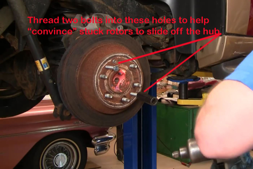 Most rotors will “walk” right off. However, for those that don’t, you can use two screws to push the rotor off.