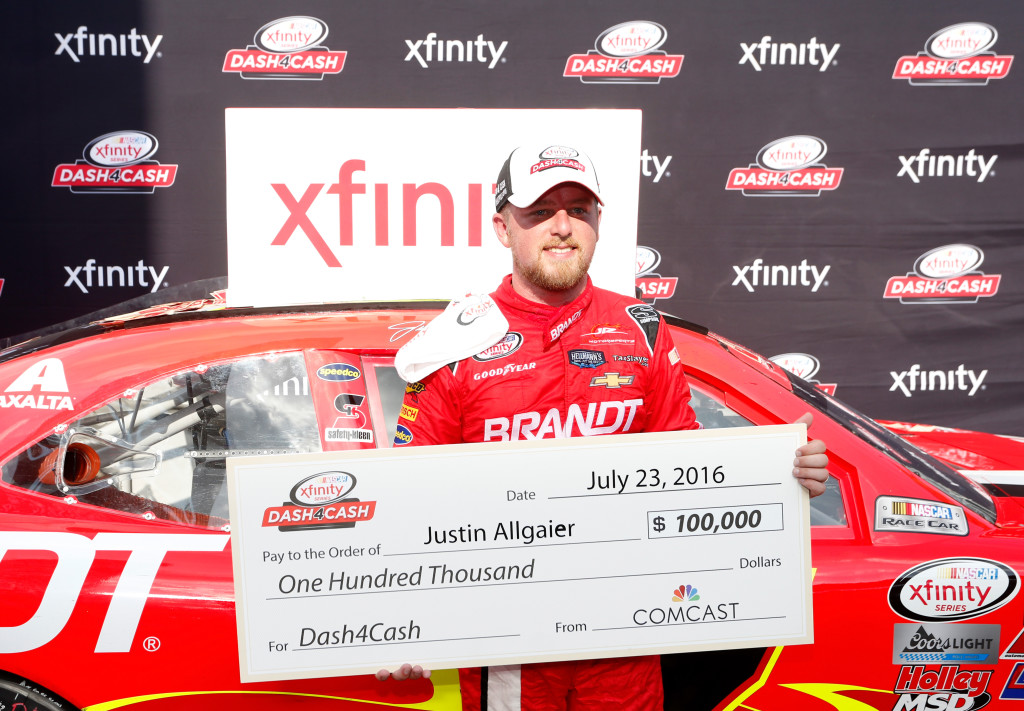 INDIANAPOLIS, IN - JULY 23:  Justin Allgaier, driver of the #7 BRANDT Chevrolet, celebrates after winning the Dash for Cash at the NASCAR XFINITY Series Lilly Diabetes 250 at Indianapolis Motor Speedway on July 23, 2016 in Indianapolis, Indiana.  (Photo by Brian Lawdermilk/Getty Images)