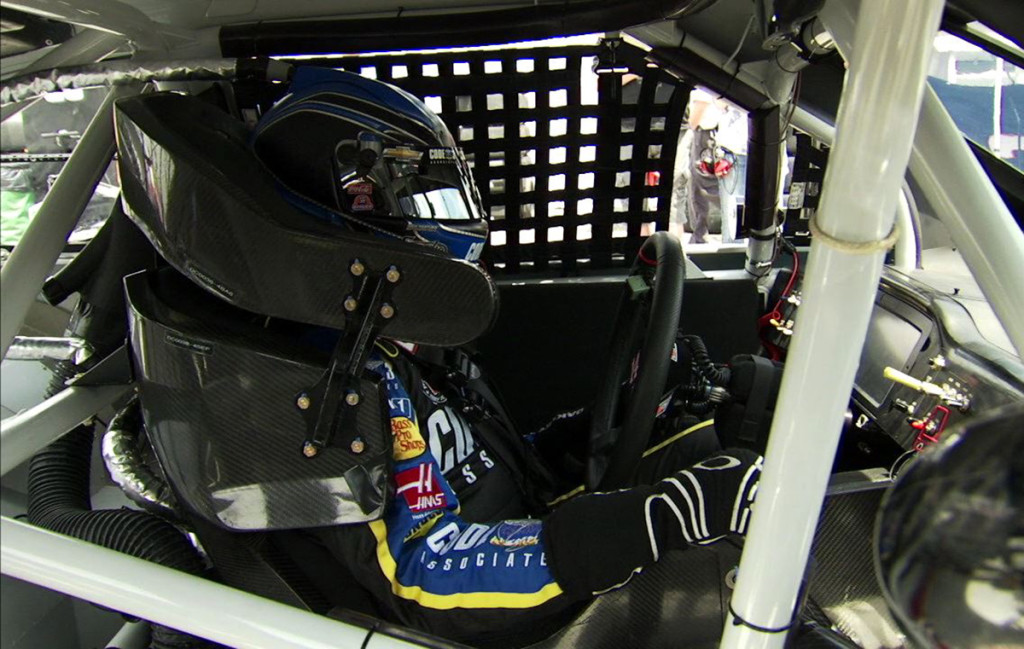 The roll cage behind the driver will be changed for superspeedway cars. NASCAR says this is to make the cage more robust and provide better protection for the driver. Image from screenshot of NASCAR video.