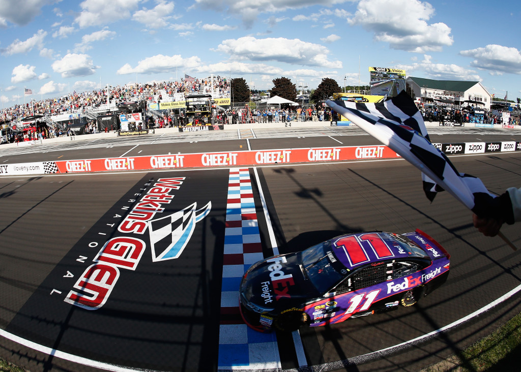 Denny Hamlin, driver of the #11 FedEx Freight Toyota, takes the checkered flag to win.(Photo by Jeff Zelevansky/NASCAR via Getty Images)
