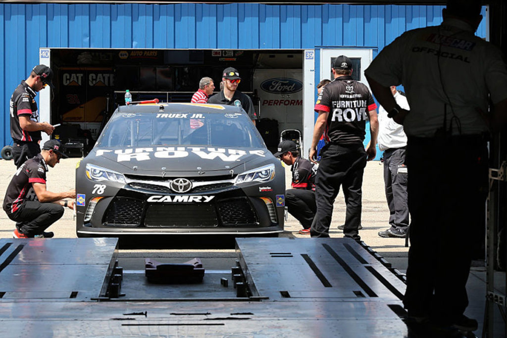 Truex’s crew readies his car for the LIS at Chicagoland. The car failed LIS twice after his win. Image courtesy foxsports.com.