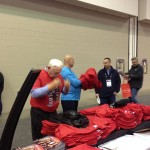 Pick Up a Free T-shirt at PRI and Enter to Win a Signed Helmet - Plus Cash Prizes!