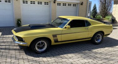 Larry Vann's 1969 Boss 302 in Competition Yellow.