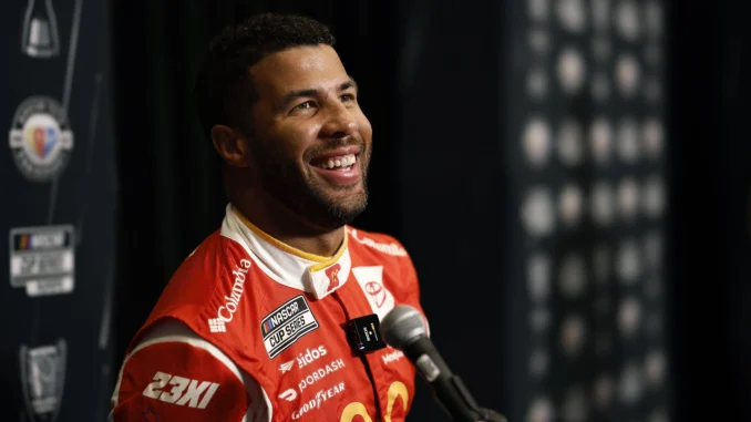NASCAR Cup Series driver Bubba Wallace speaks with the media during the NASCAR Cup Series Playoff Media Day at Charlotte Convention Center on August 31, 2023 in Charlotte, North Carolina. (Photo by Jared C. Tilton/Getty Images)